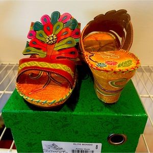 Brand new tan/ multicolored wedges. Size 8